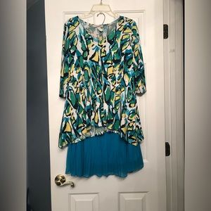 Top (with sparkles) and skirt (with small pleats). Not a set but worn as such.